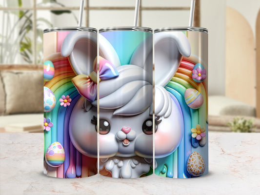 Easter bunny tumbler with rainbows and decorated eggs.