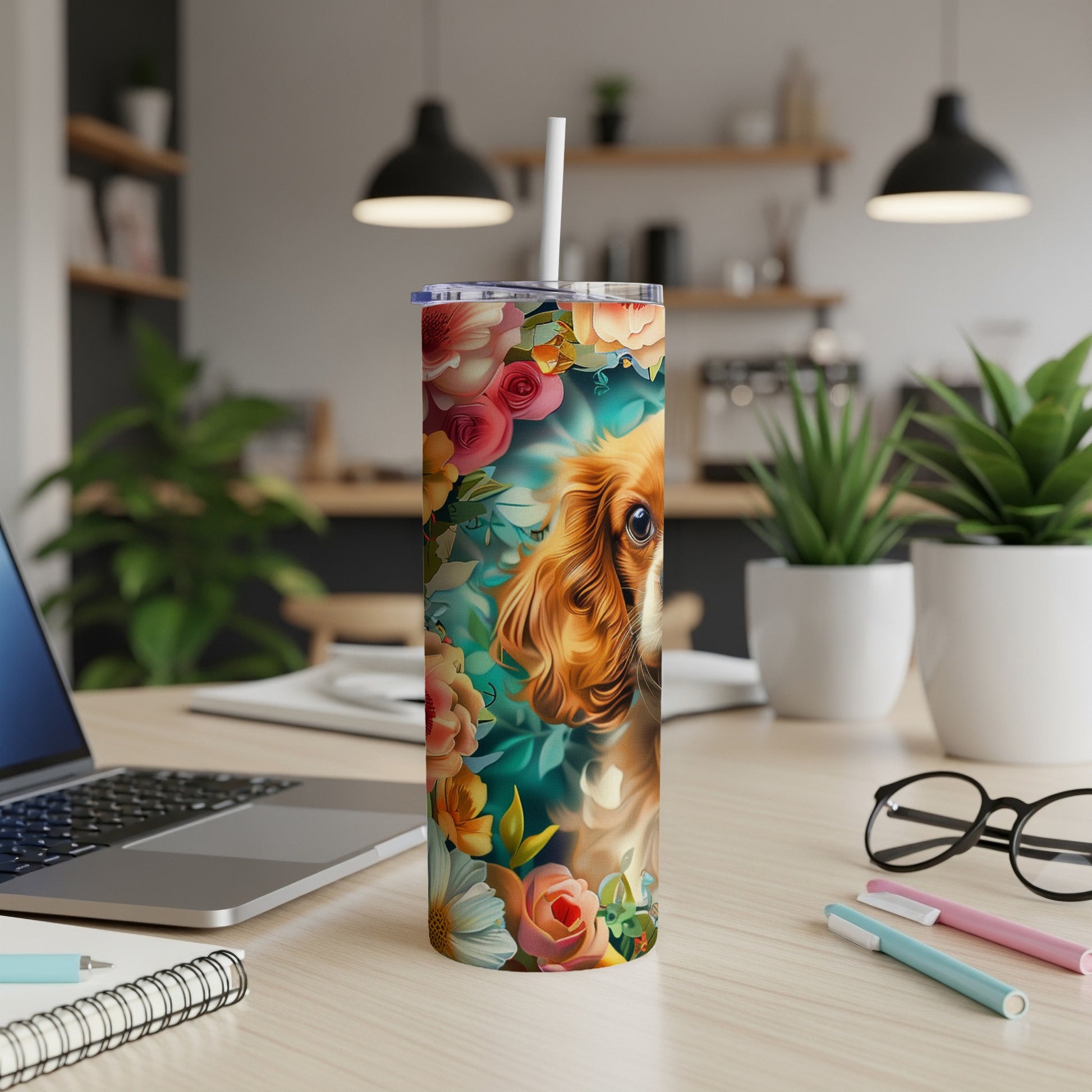 Cavalier King Charles Spaniel with floral pattern on a white tumbler.
