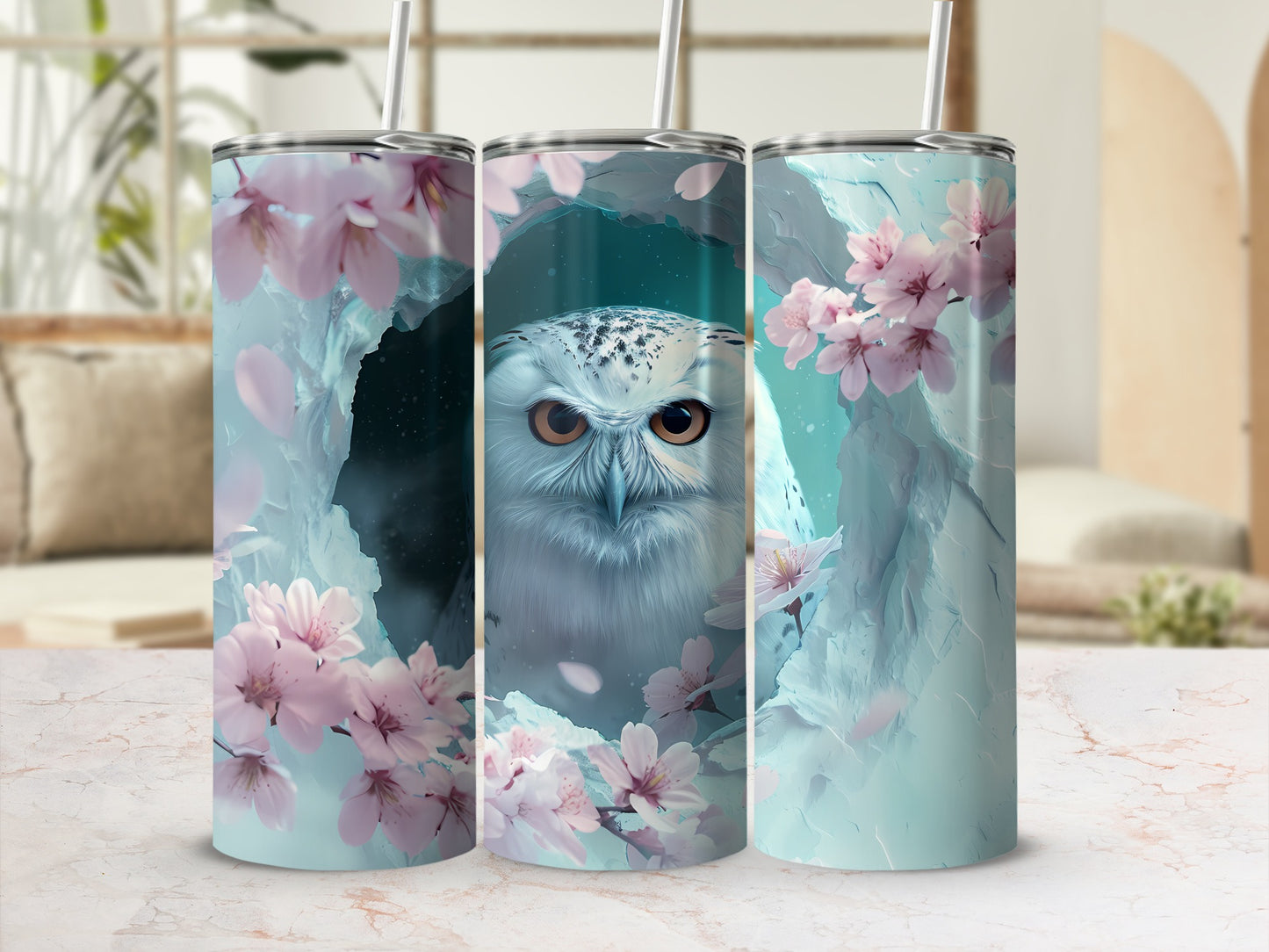 Owl with cherry blossoms on a skinny tumbler.