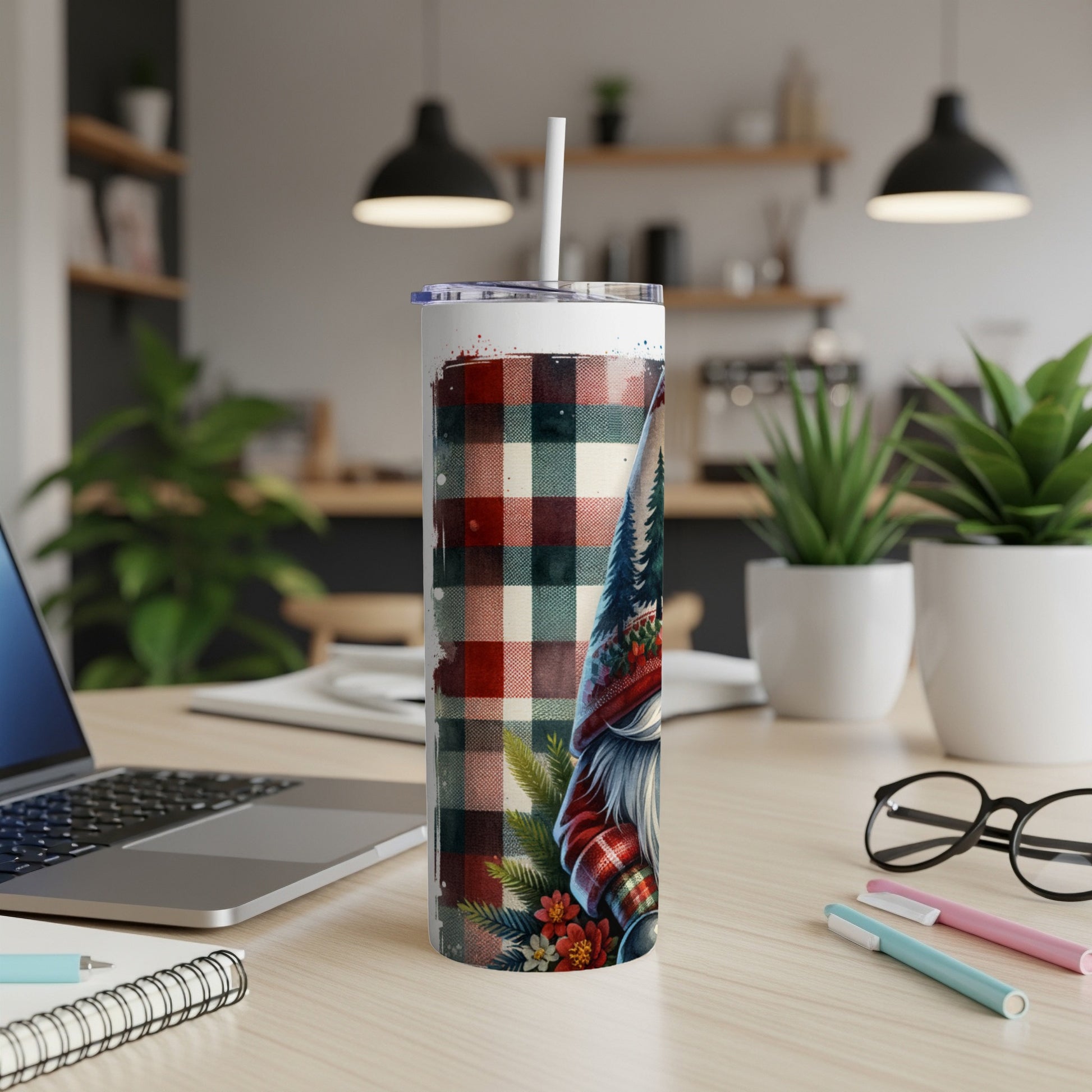 Christmas gnome tumbler with plaid pattern and festive accents.