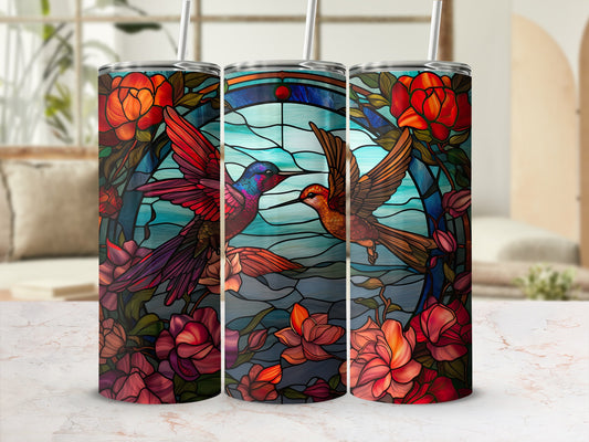 Stained glass tumbler with hummingbirds and floral accents.