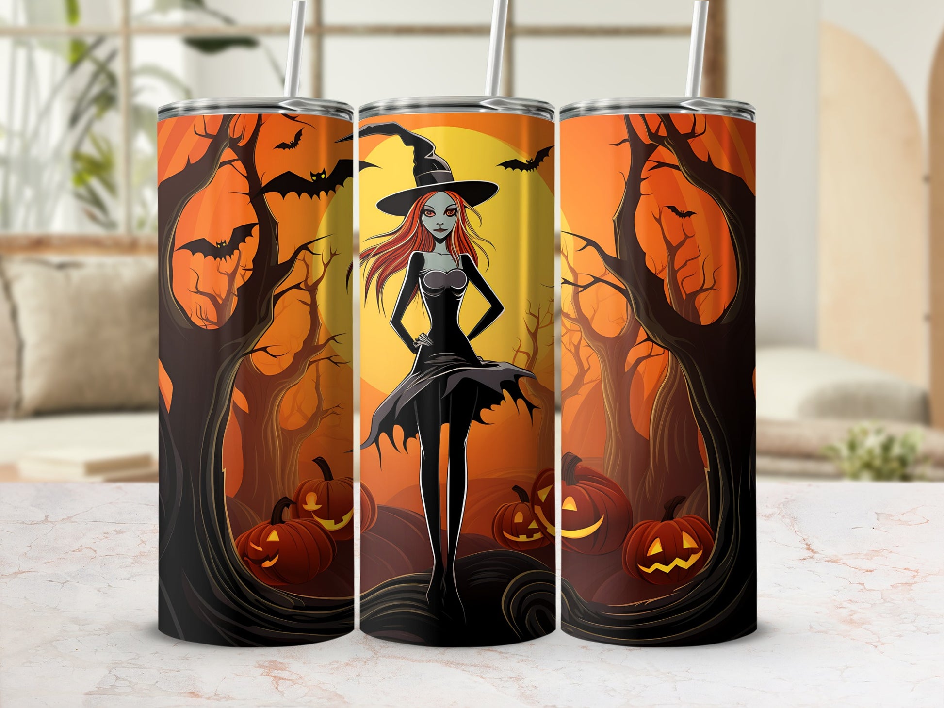 Three tumblers with Halloween witch and pumpkin design on a striped background.