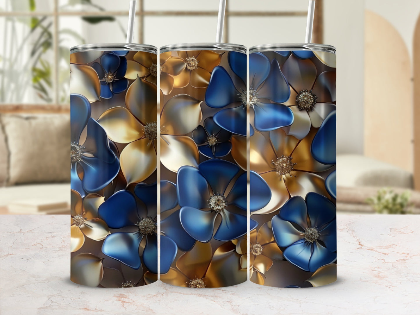 Three tumblers with a close-up floral pattern in blue and gold.