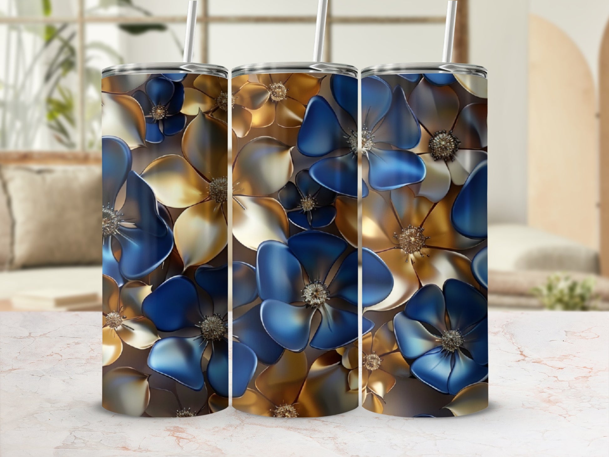 Three tumblers with a close-up floral pattern in blue and gold.