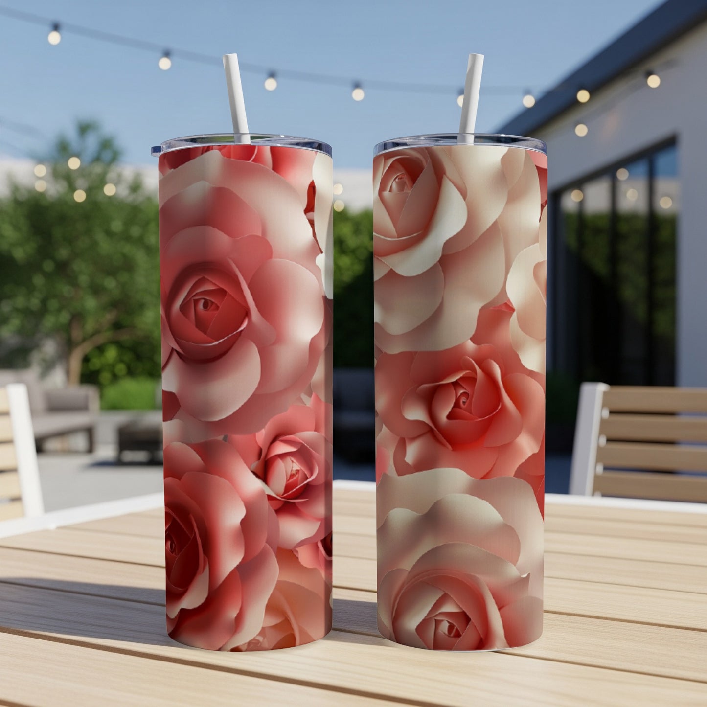 Two tall tumblers with a detailed pink and cream rose floral pattern.