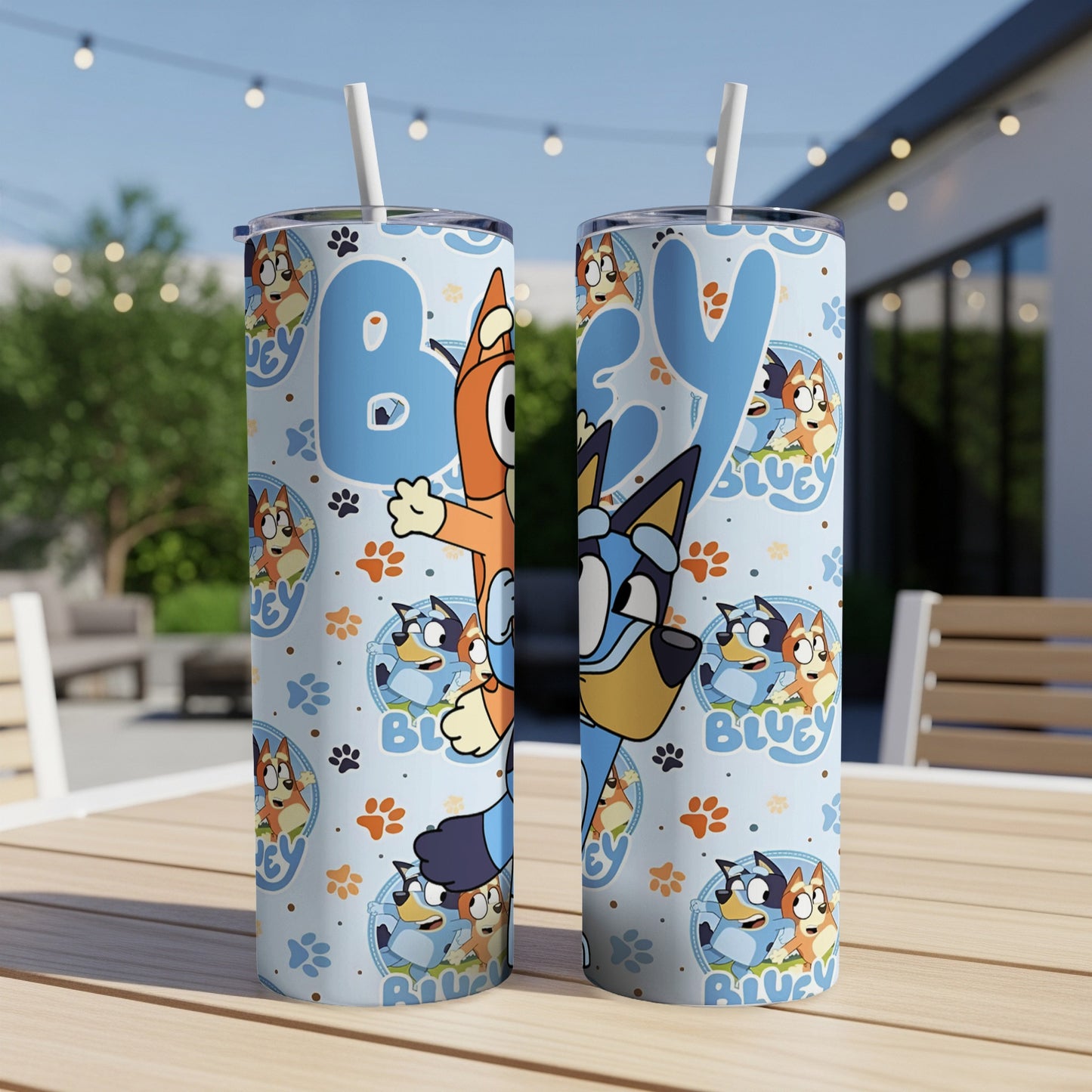 Bluey characters on a light blue patterned insulated tumbler with a straw.