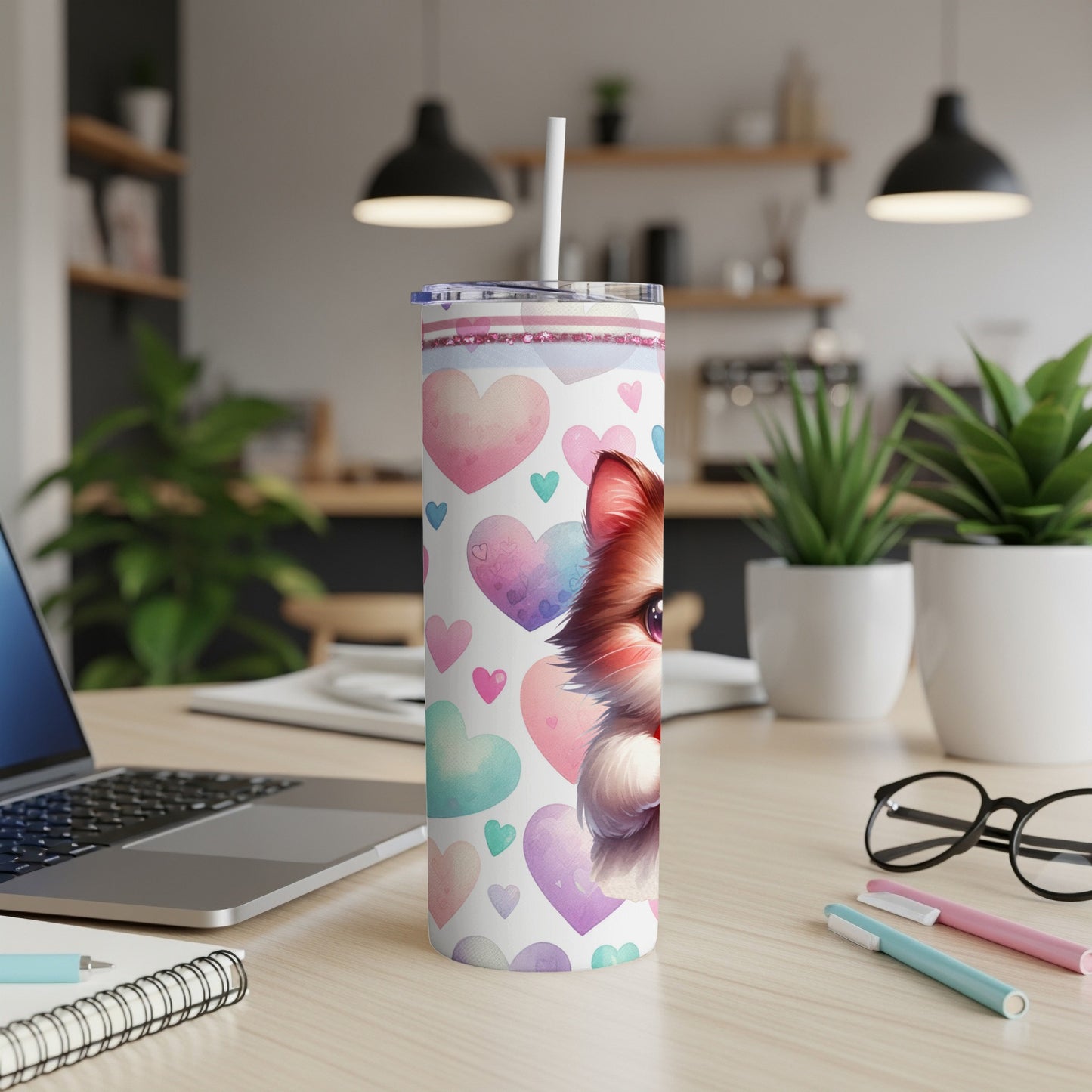 White tumbler with hearts and a cartoon fox face.