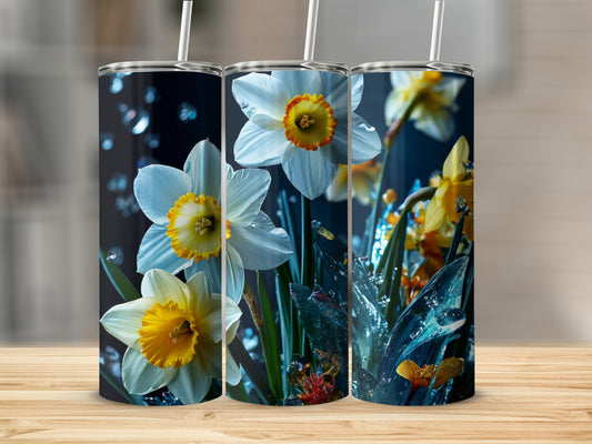 Three tall tumblers featuring white and yellow daffodils and water splashes.