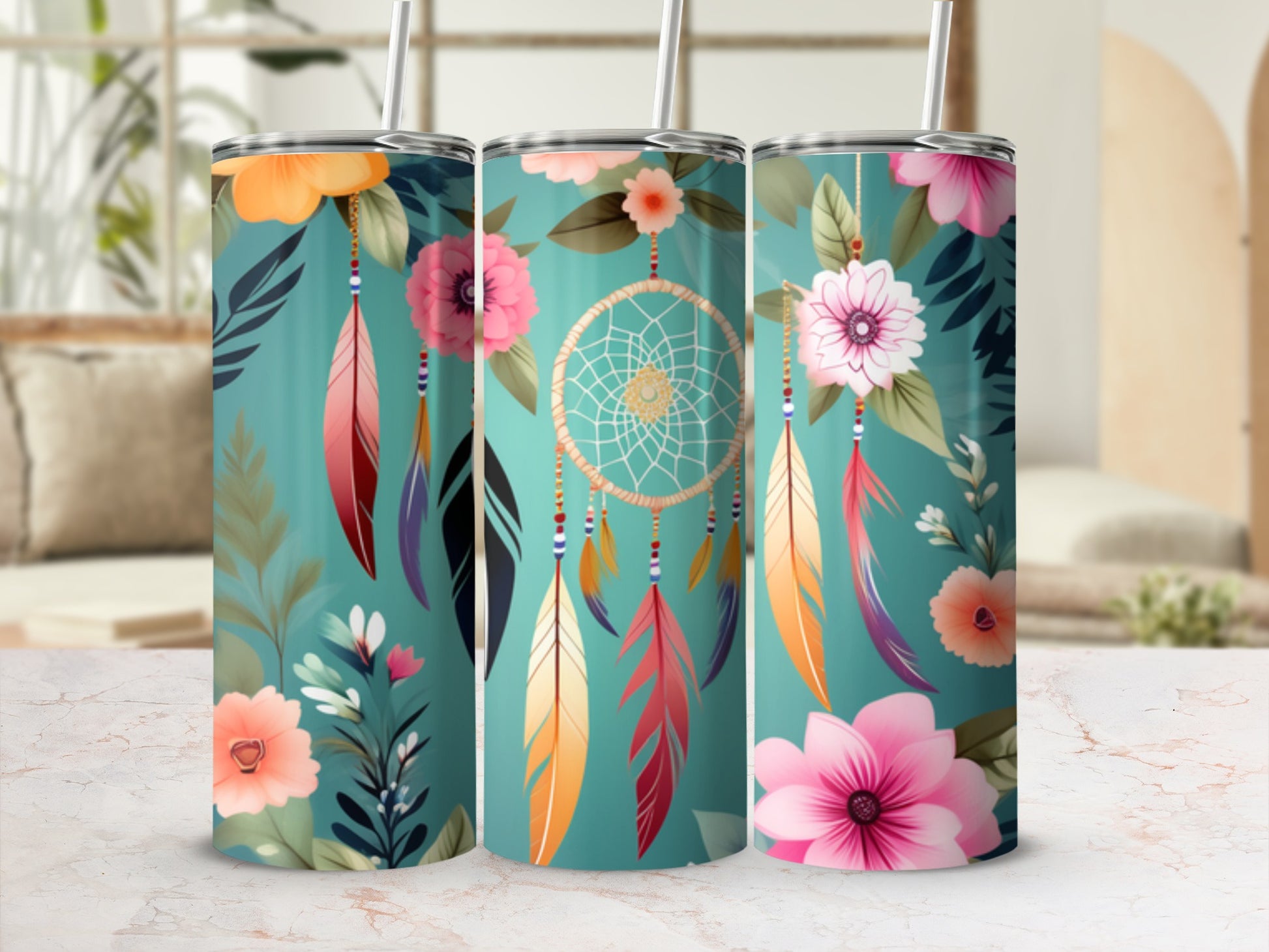 Three teal tumblers with floral and dreamcatcher designs.