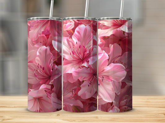 Pink azalea flowers on a tumbler design with white straws.