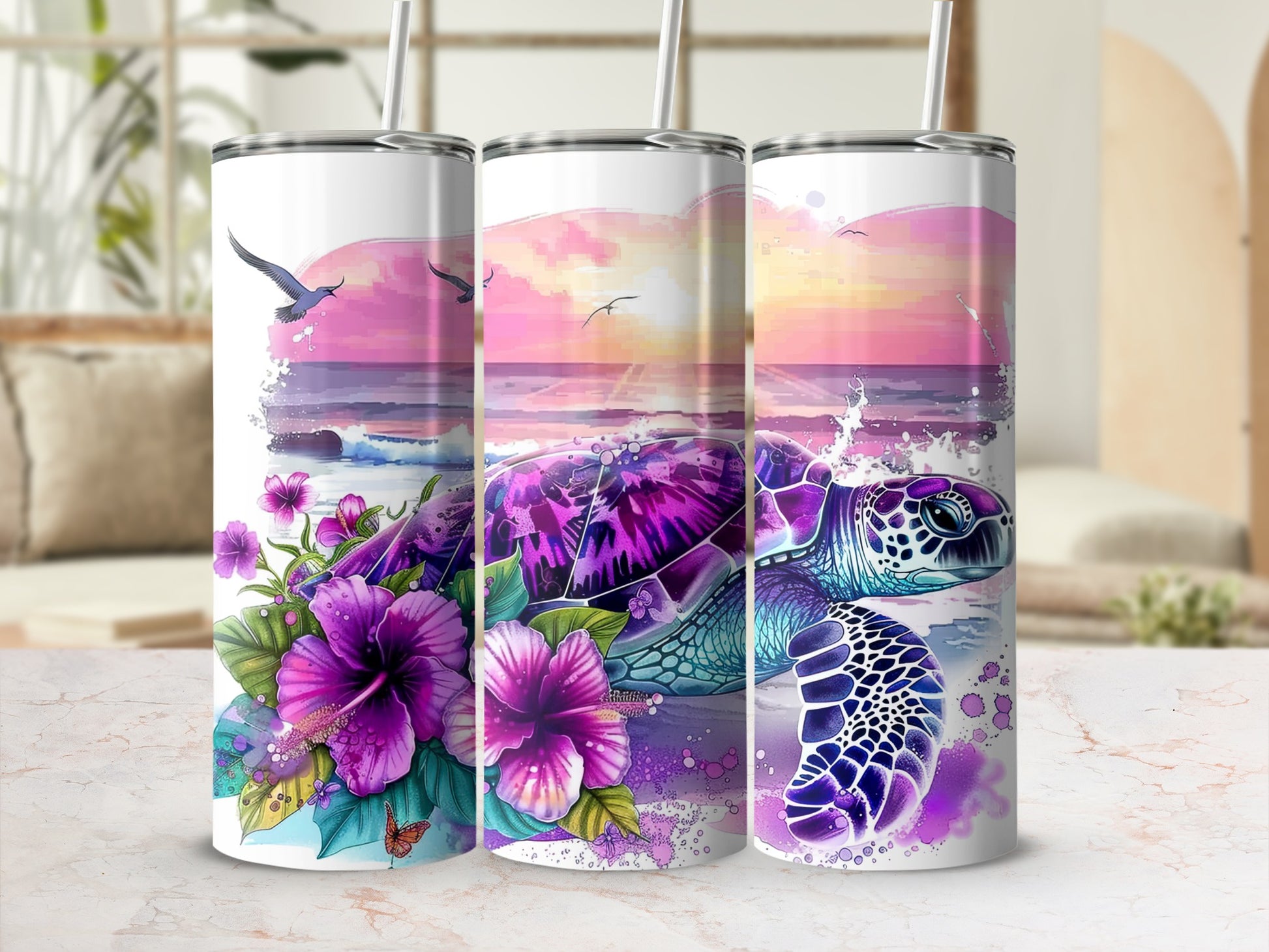 Turtle and hibiscus flowers on a beach sunset scene, on three tumblers.