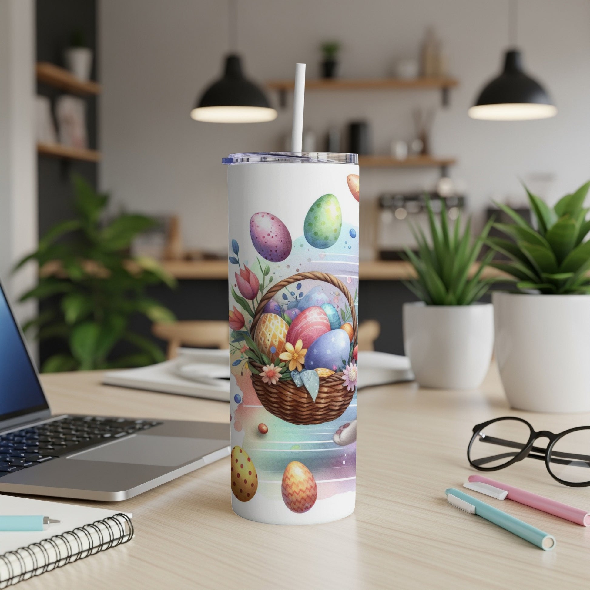 White tumbler with Easter basket and colorful eggs design.