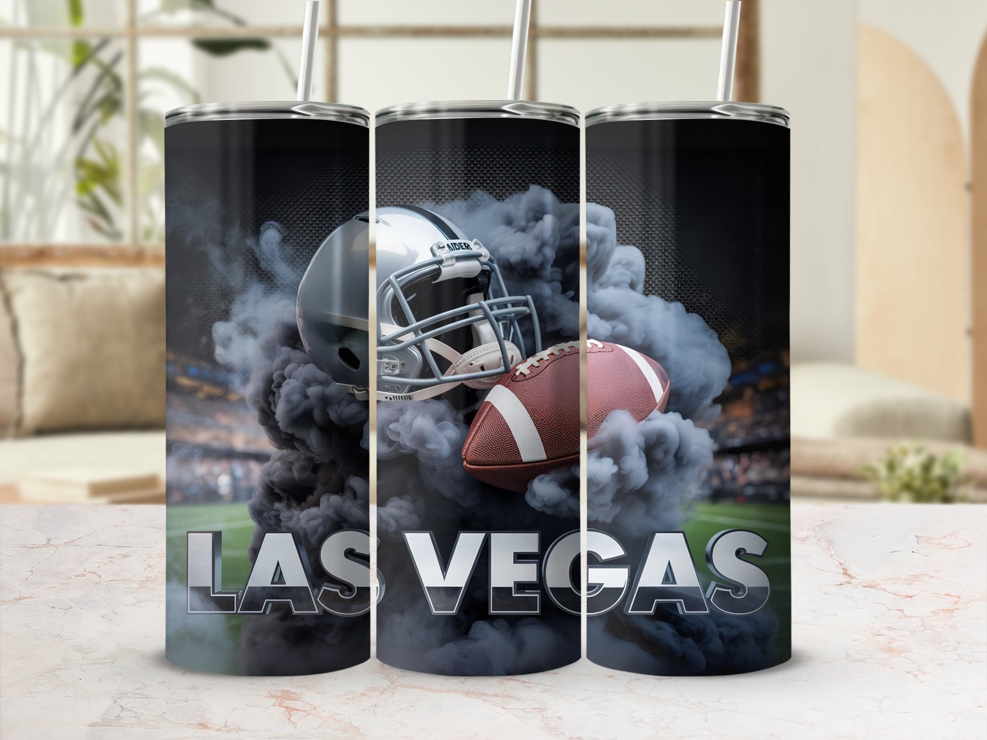 Las Vegas Raiders football helmet and ball on tumblers surrounded by smoke.
