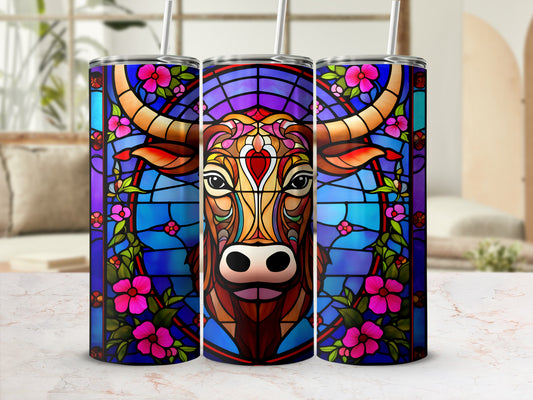 Stained glass tumbler featuring a bull's head surrounded by colorful flowers.