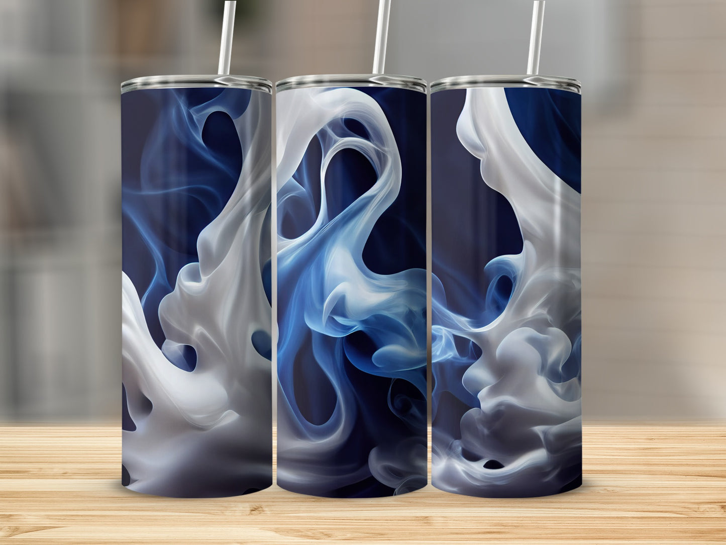 Three tumblers with blue and white smoke abstract design.