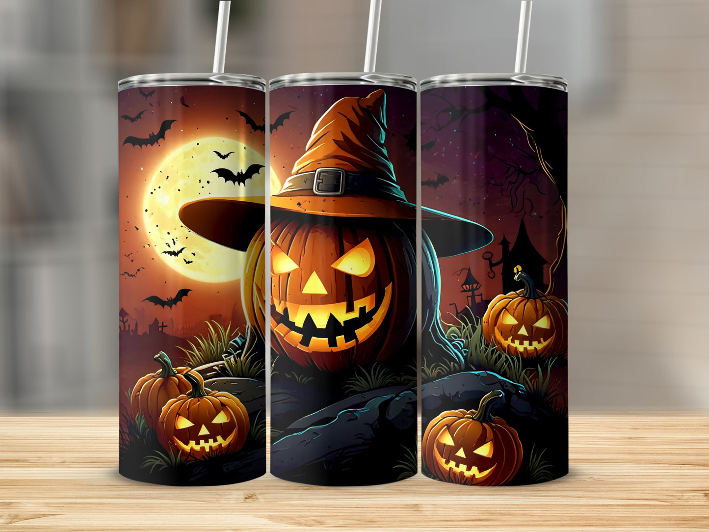 Three tumblers with a Halloween scene featuring Jack-o'-lanterns, a full moon, and bats.