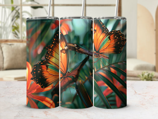 Three tumblers with vibrant butterfly and floral pattern.