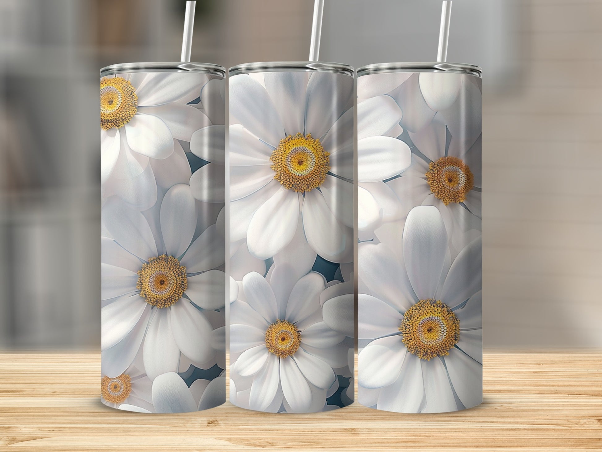 Three tumblers featuring a delicate white daisy floral pattern.