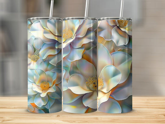 Three tumblers with a floral pattern of large, light-colored flowers.