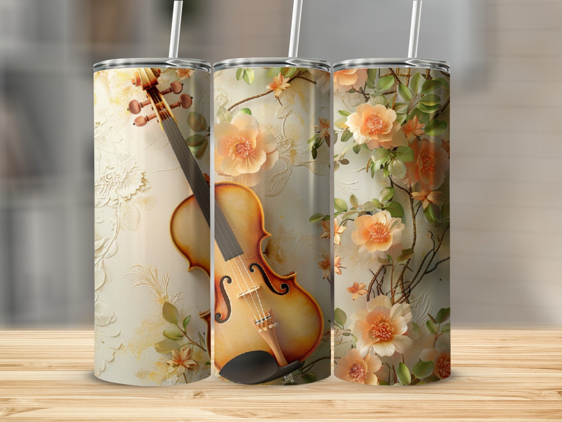 Violin and peach floral design on three tumblers.