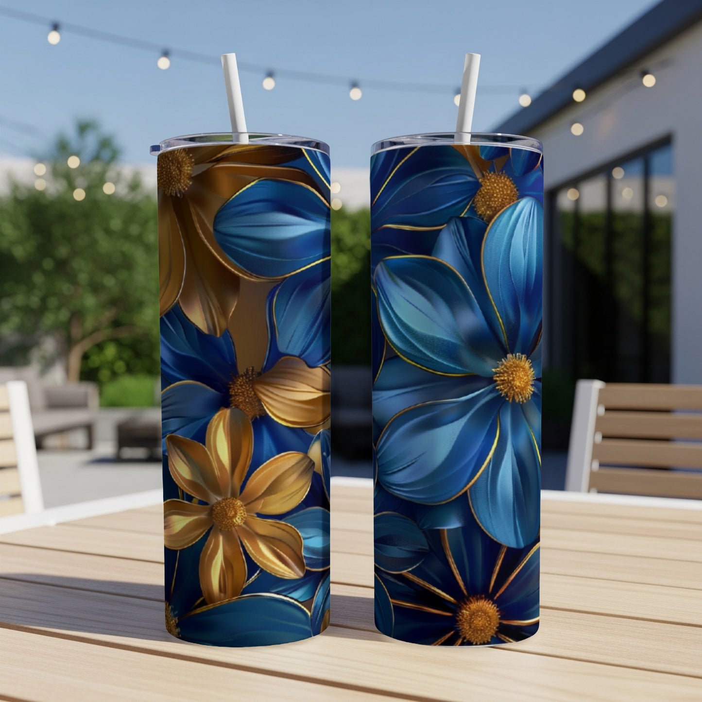 Two tall tumblers with a blue and gold floral pattern.
