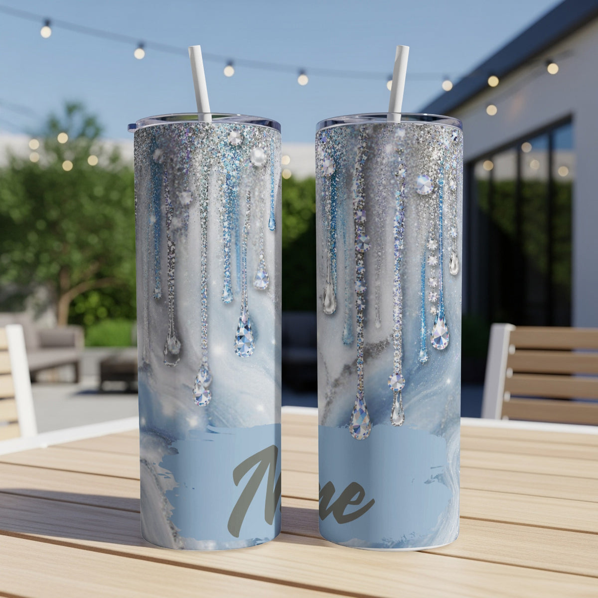 Two tumblers with dripping diamond and glitter design and personalized name space.