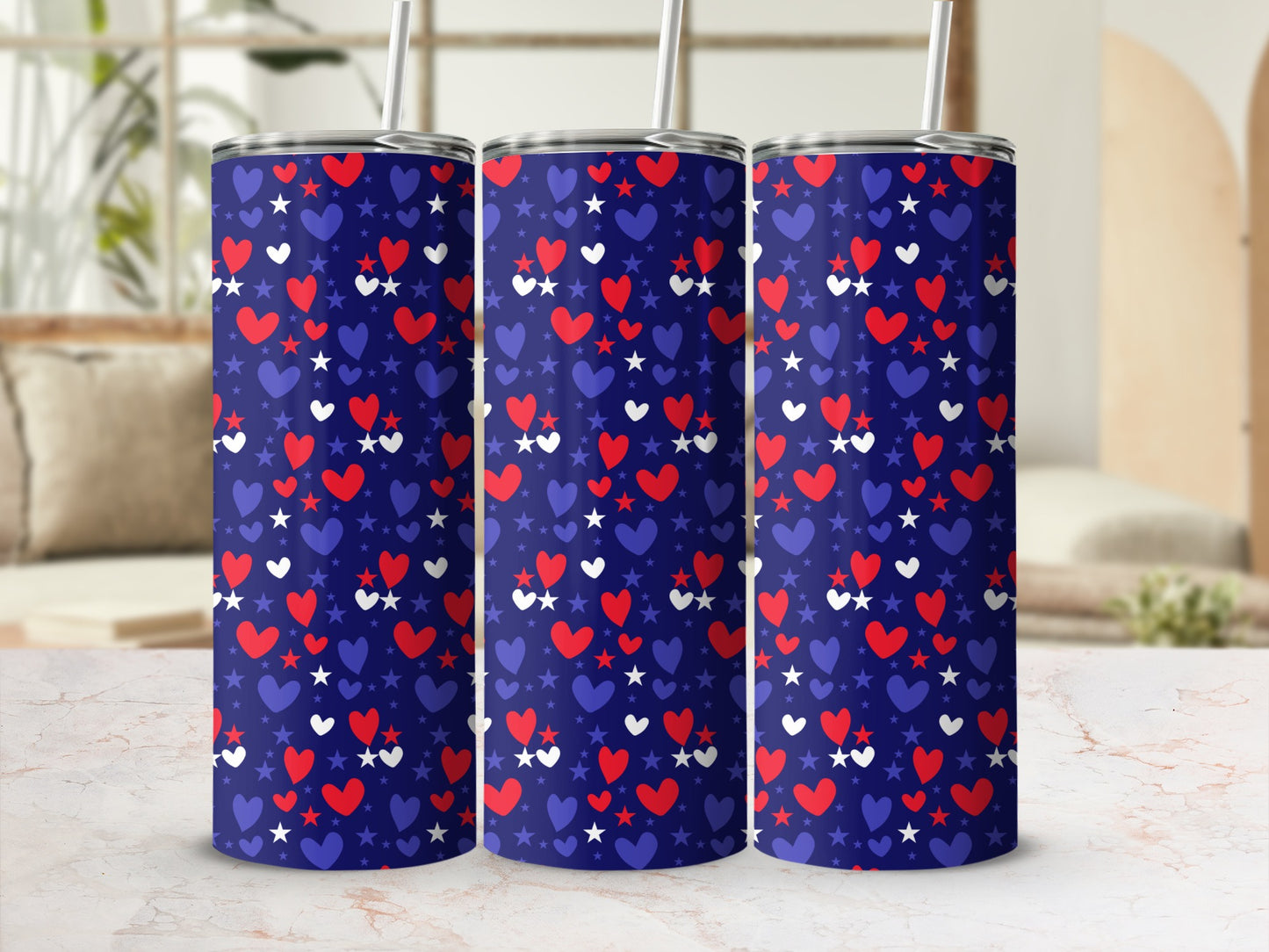 Three tumblers with a red, white, and blue star and heart pattern.
