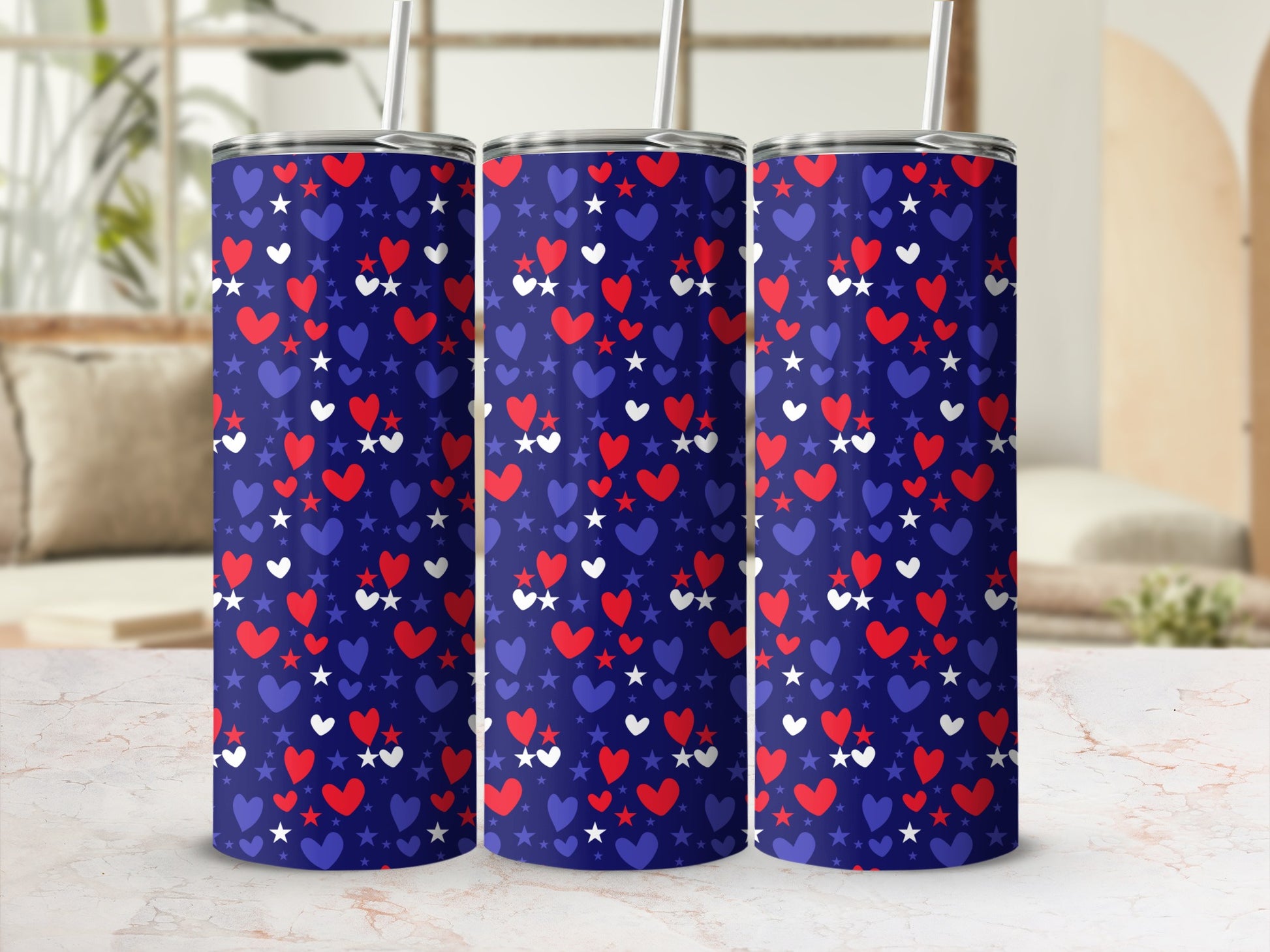 Three tumblers with a red, white, and blue star and heart pattern.