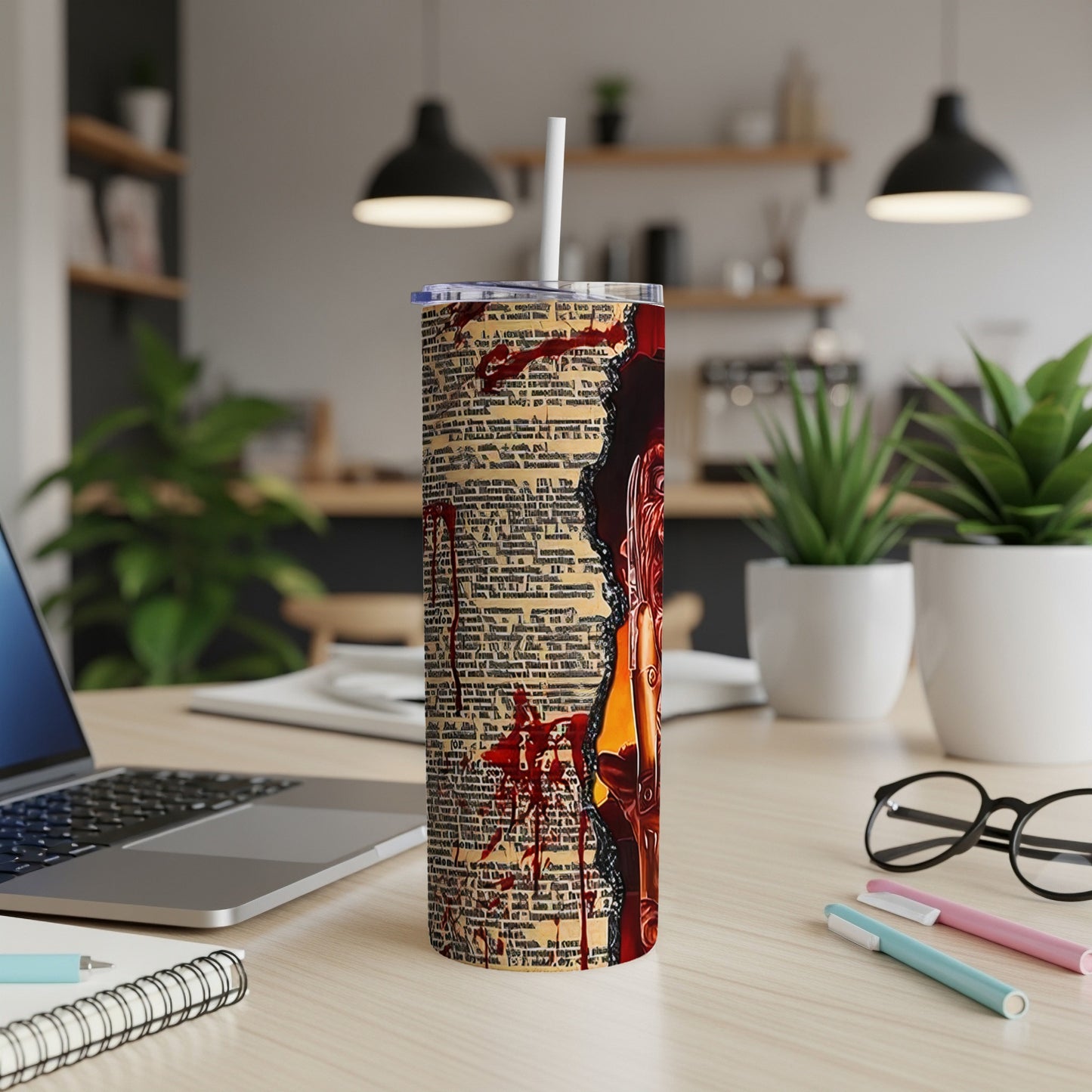 Tumbler with distressed dictionary pages, blood splatters, and a portrait silhouette.