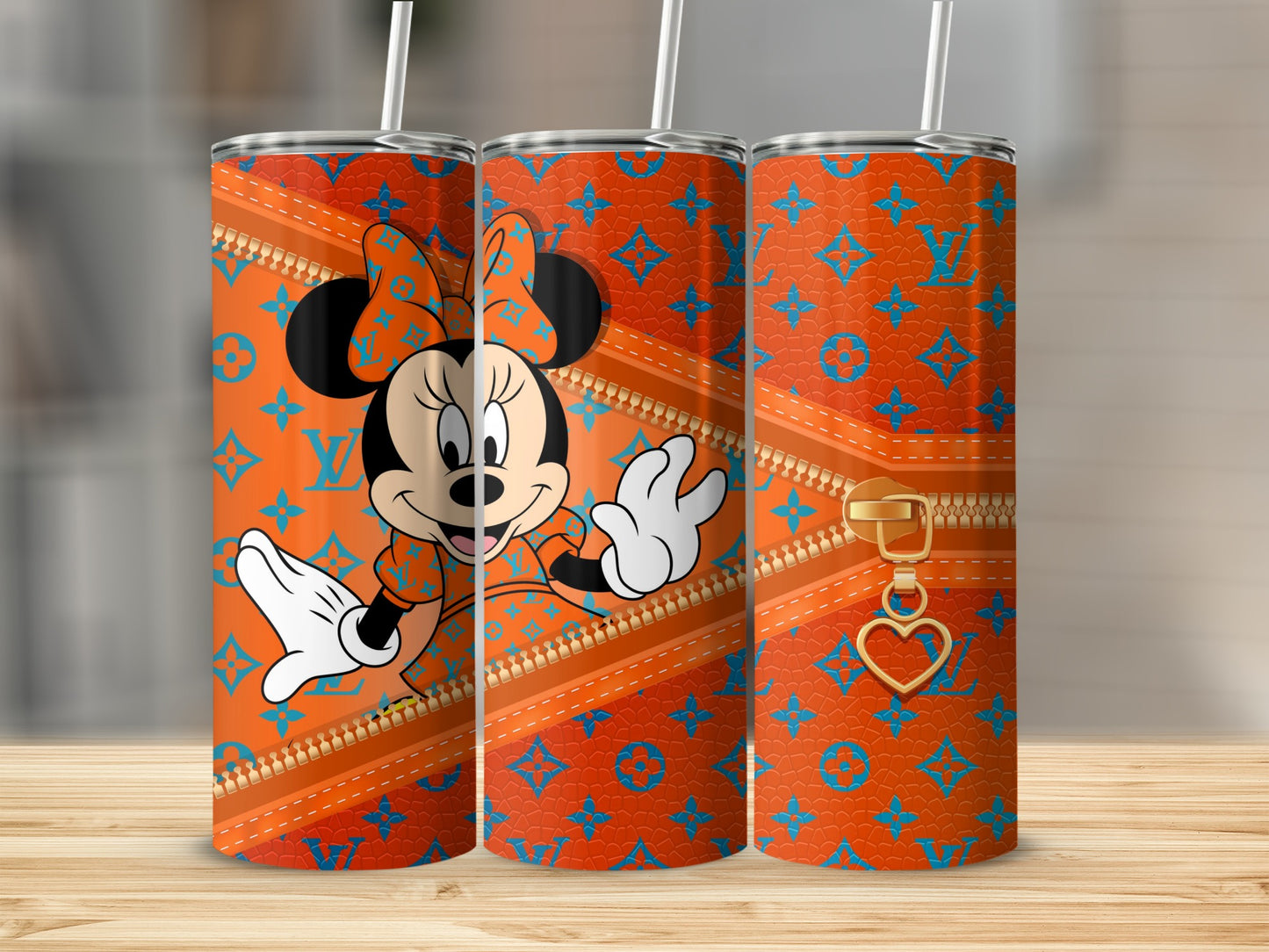 Minnie Mouse on orange tumbler with Louis Vuitton pattern and zipper detail.