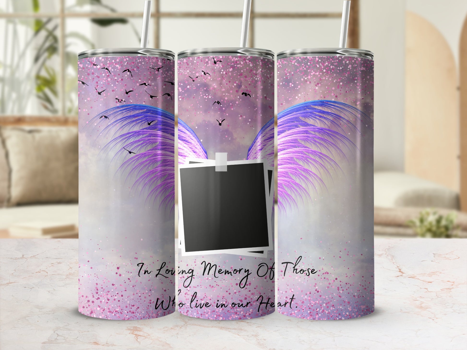 Tumbler with purple wings, birds, and text "In Loving Memory Of Those Who Live in our Heart."
