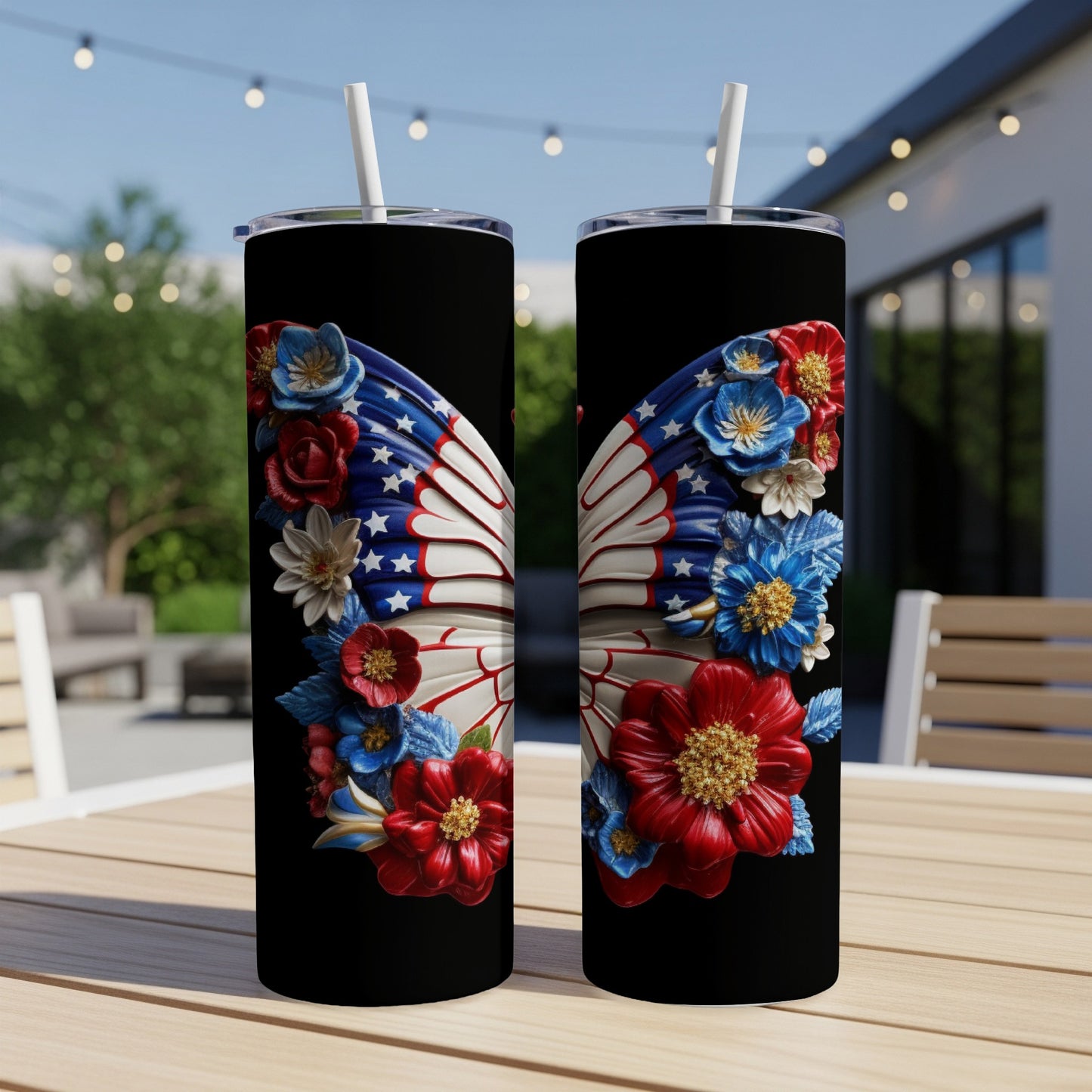 Two tumblers with butterfly wings decorated with red, white, and blue flowers.