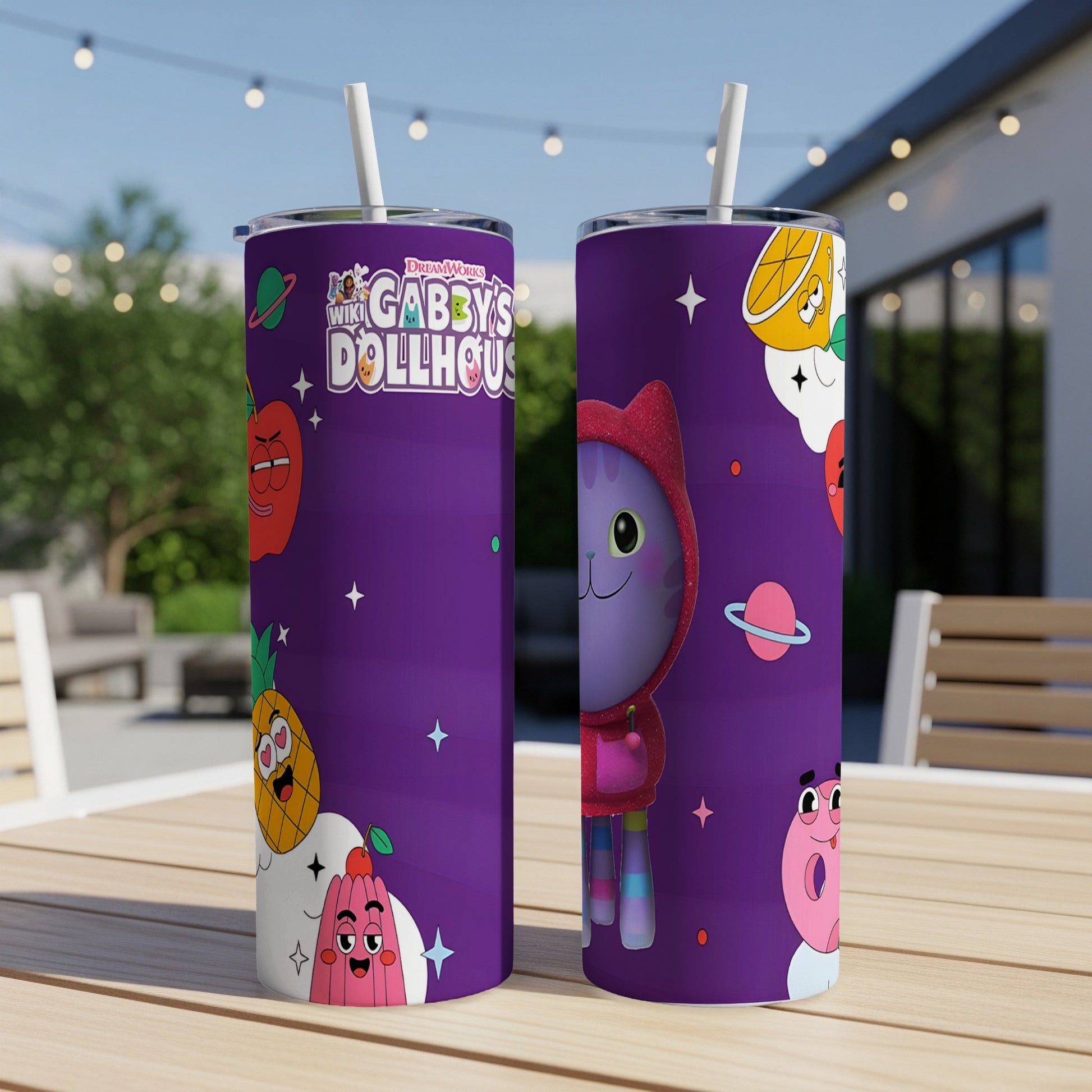 Purple Gabby's Dollhouse tumbler with cartoon characters and straws.