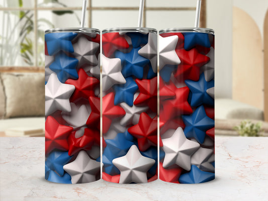 Three tumblers with red, white, and blue stars and straws.