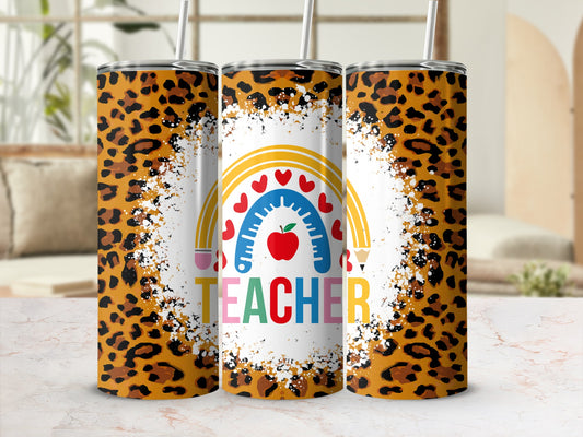 Leopard print tumbler with rainbow, apple, and "TEACHER" text.