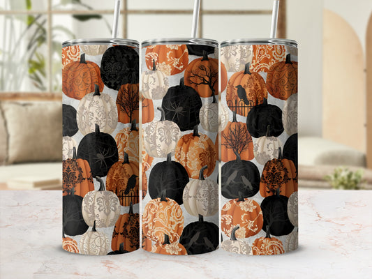 Three tumblers with a Halloween pumpkin and crow pattern.