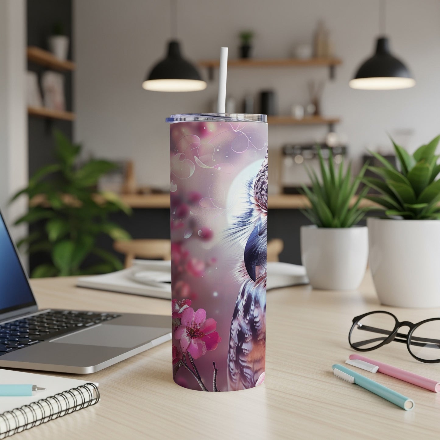 Owl illustration on a skinny tumbler with cherry blossoms.
