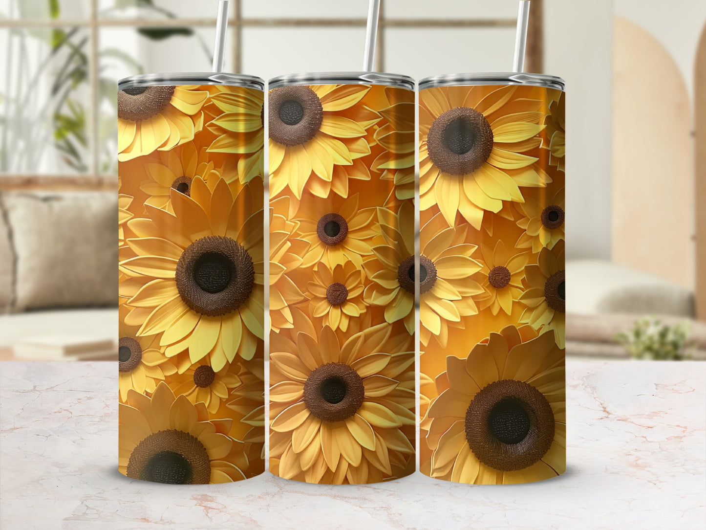 Three tumblers with a sunflower pattern against a blurred background.