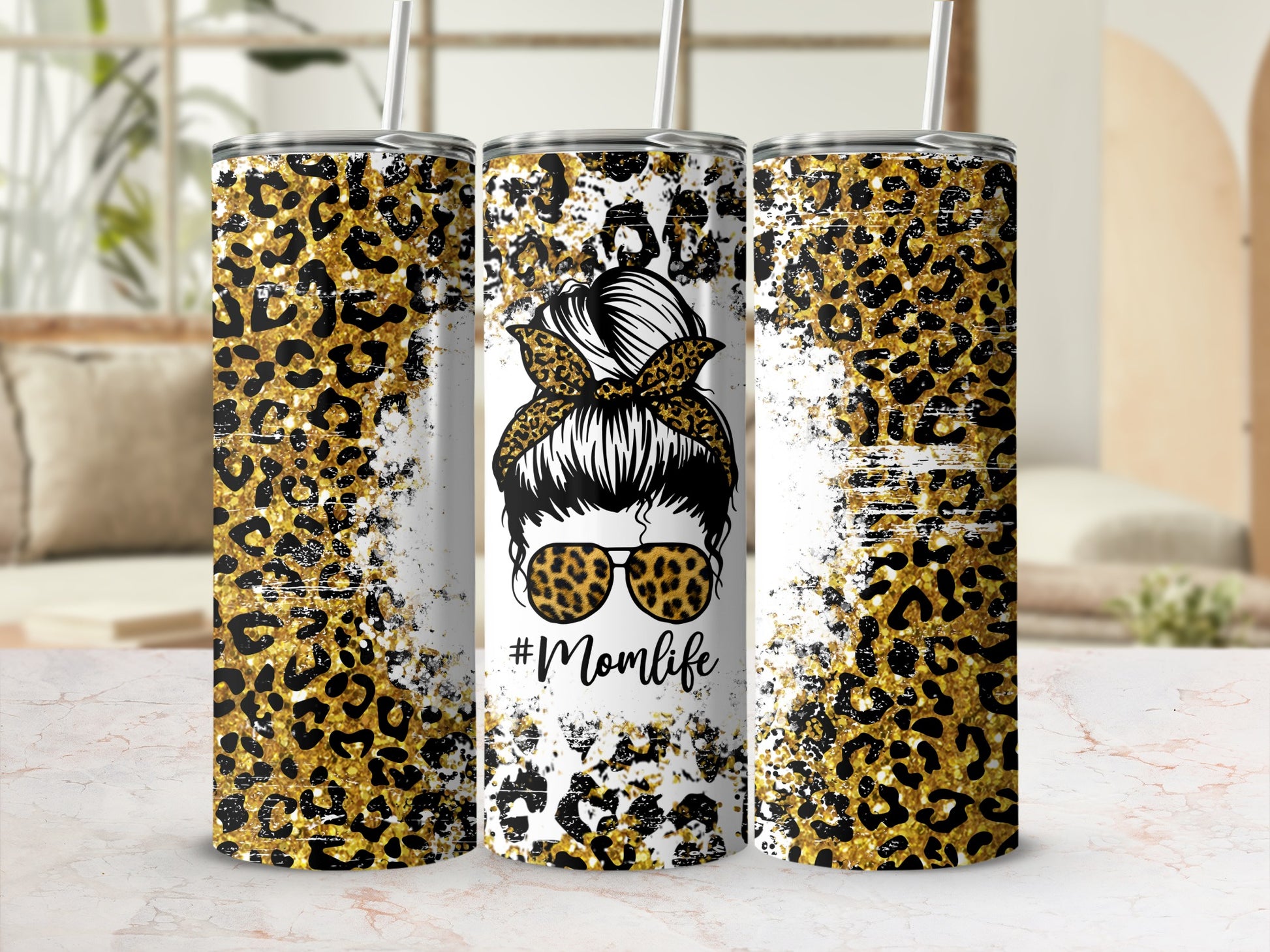 Leopard print tumbler with "#Momlife" text and a woman's silhouette.