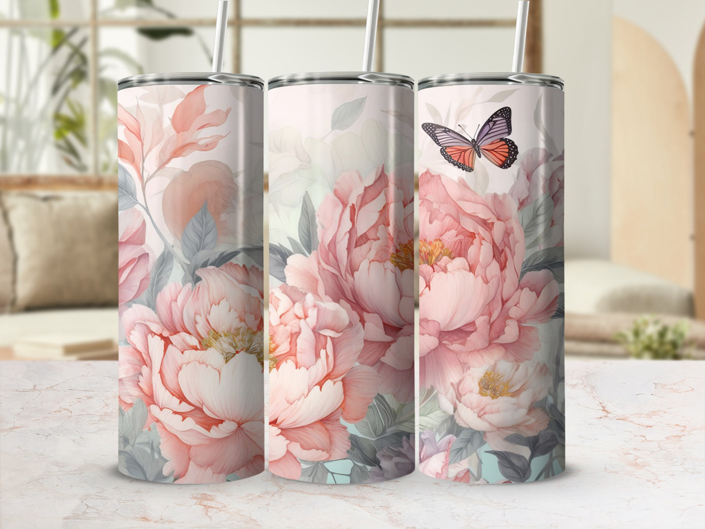 Three tall tumblers with a soft floral and butterfly design.
