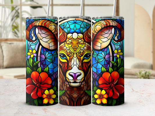 Triptych of colorful tumblers featuring a stained-glass ram head design with floral accents.
