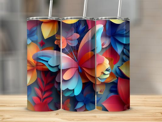 Three tumblers with colorful floral and butterfly designs.