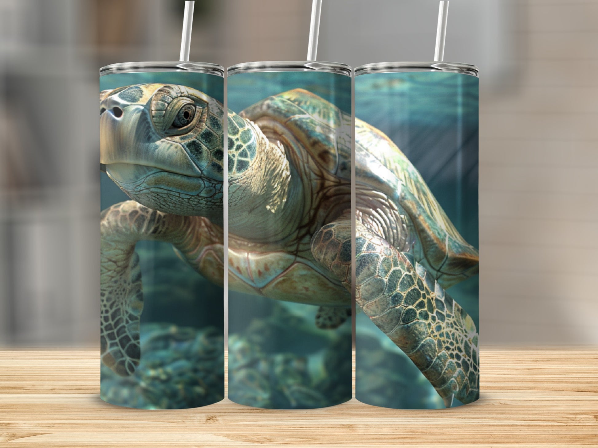 Sea turtle swimming underwater with textured shell, displayed on three tumblers.