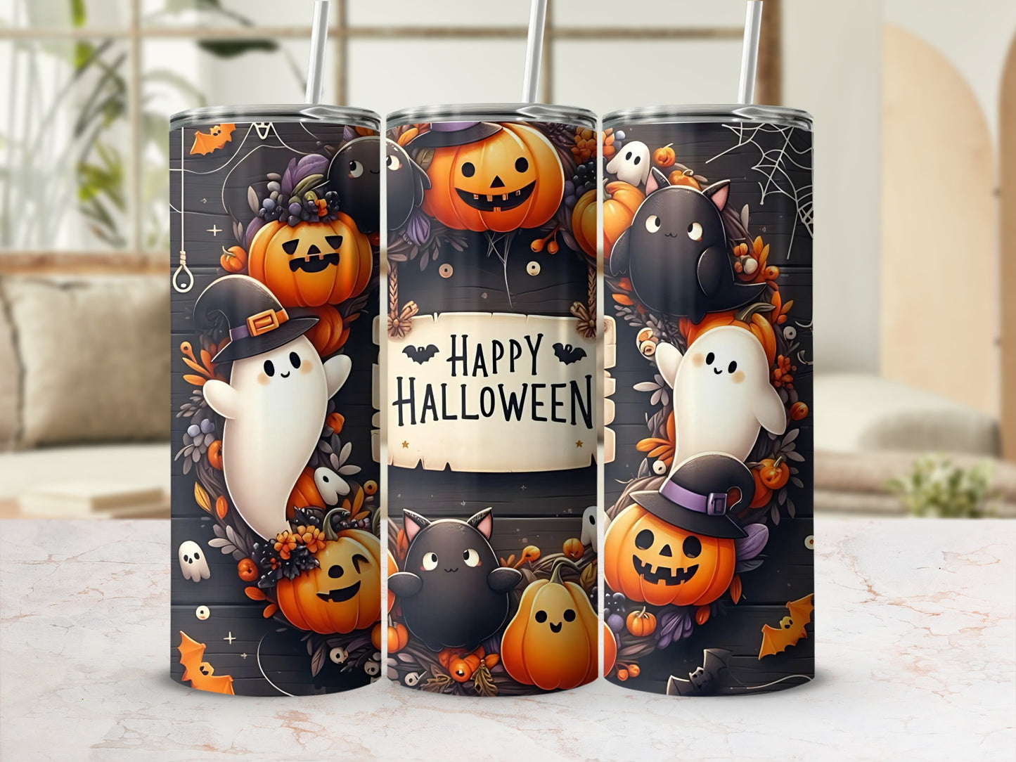 Three Halloween themed tumblers with ghosts, pumpkins, and bats.