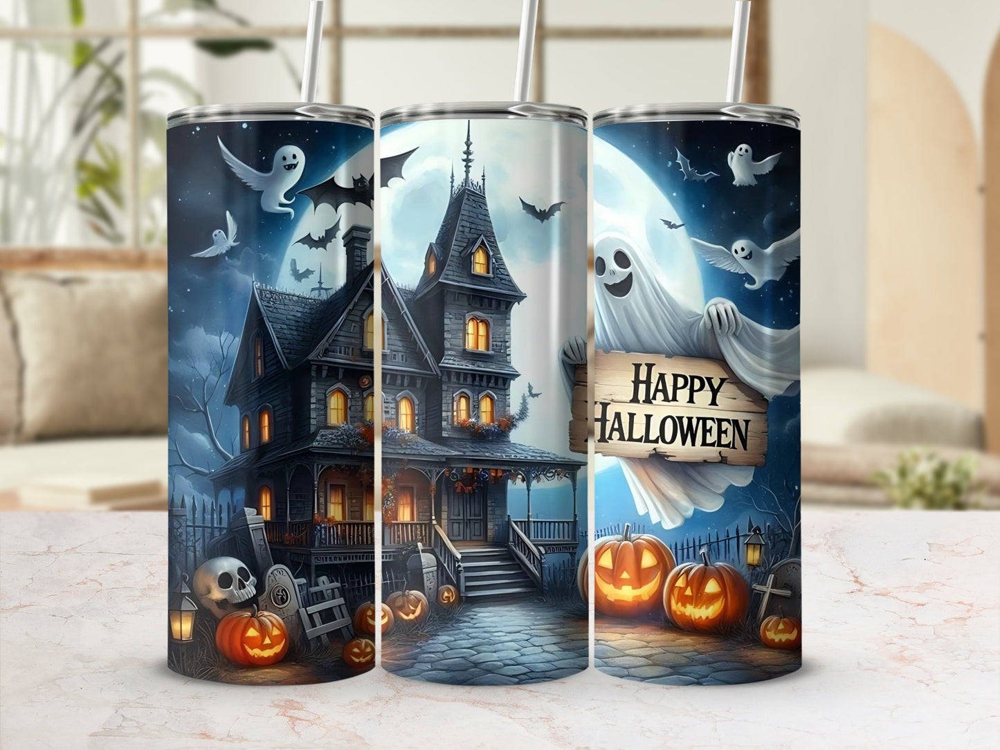 Three tumblers with Halloween haunted house, ghosts, pumpkins, and bats.