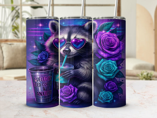 Raccoon in heart sunglasses drinks from iced coffee cup on purple and blue floral background.