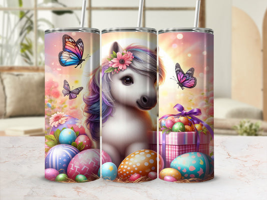 Unicorn with butterflies and Easter eggs on a tumbler.