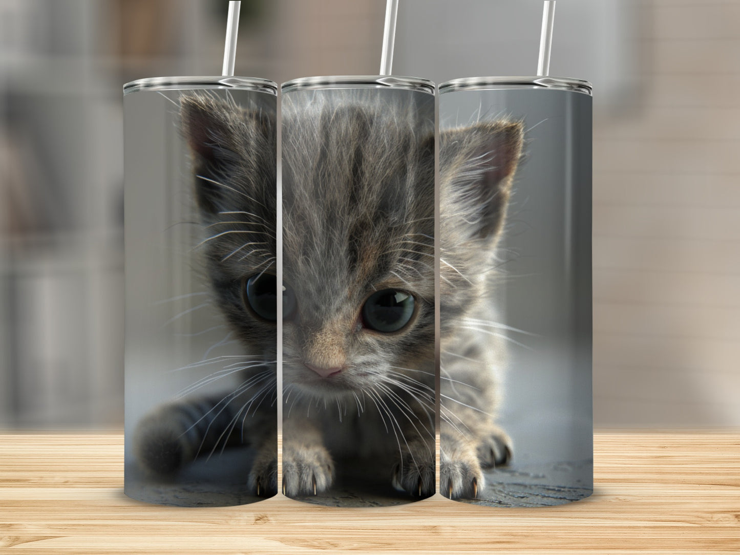 Triptych of a fluffy grey tabby kitten with large green eyes.
