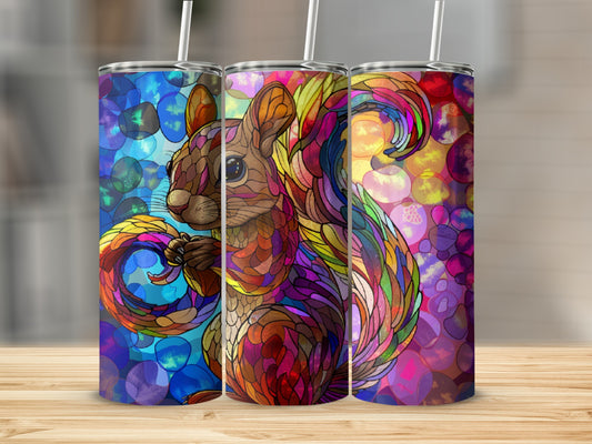 Three colorful stained-glass style tumblers featuring a squirrel with a bushy tail.