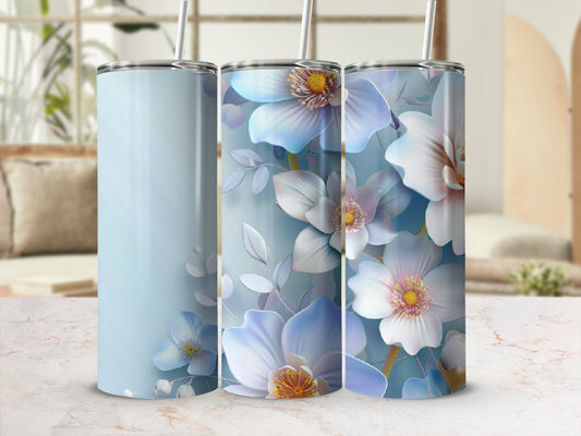 Light blue tumbler with delicate floral design in soft blues and whites.